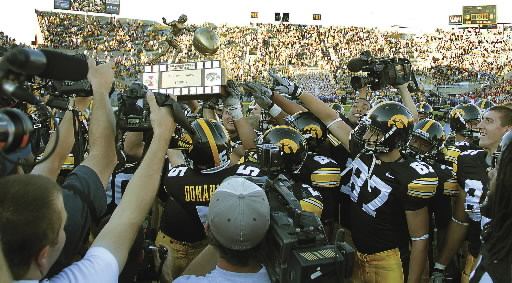 Hawkeyes reclaim Cy-Hawk Trophy after holding off Iowa St. late in 20-13  win with Trump on hand - The San Diego Union-Tribune