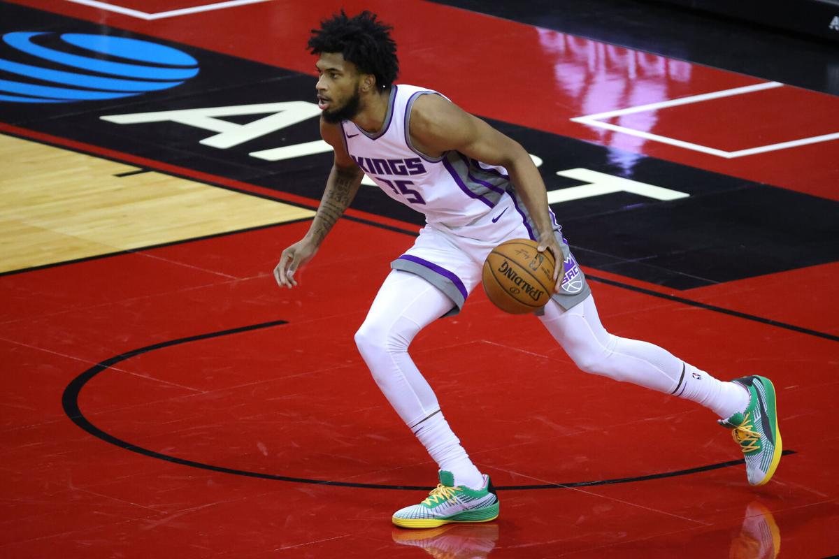 Marvin Bagley III of the Sacramento Kings controls the ball during the second quarter of a game against the Houston Rockets at Toyota Center on January 02, 2021 in Houston, Texas.