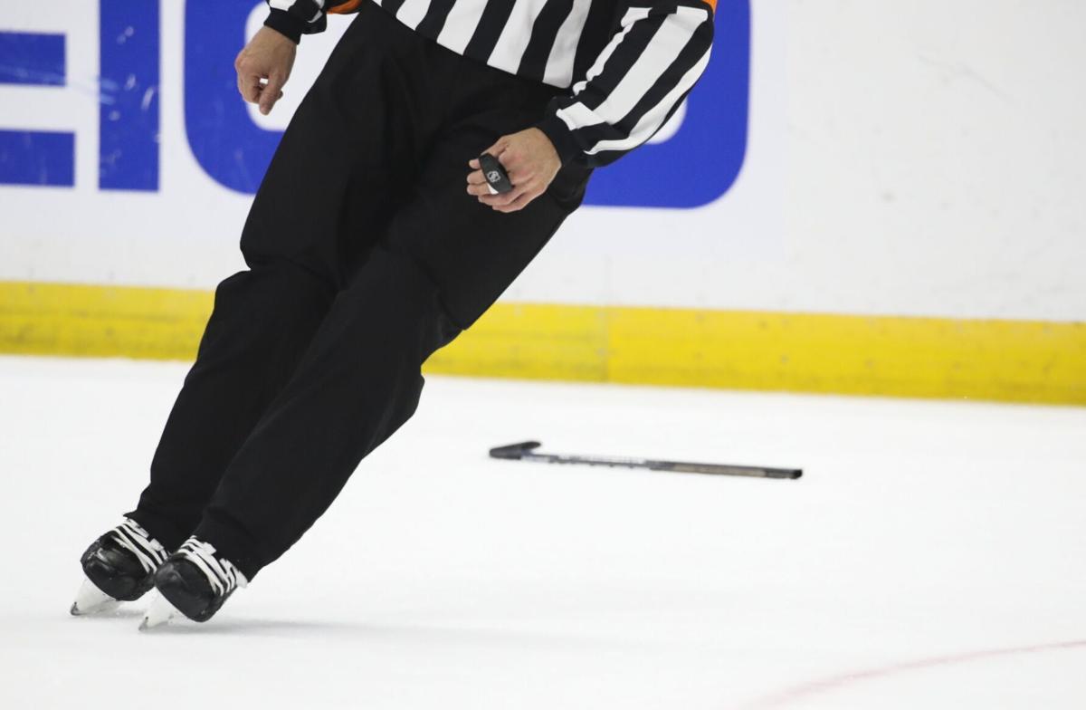 A broken stick remains on the ice as the Lightning take on the Hurricanes in Game 3..