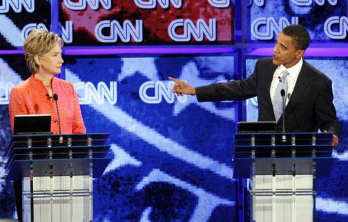 Clinton, Obama trade barbs in Quad-City Times interviews