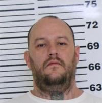 Christopher Railsback Davenport man charged for kicking, beating chained dog