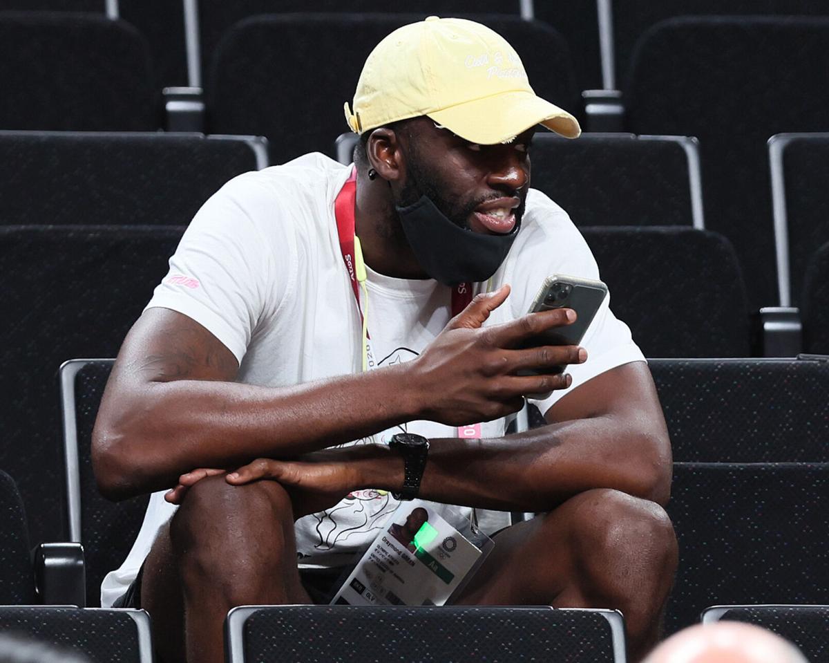 Draymond Green looks on during the first half of a Women's Basketball Preliminary Round Group B game between France and the USA during the Tokyo 2020 Olympic Games at Saitama Super Arena on August 02, 2021, in Saitama, Japan.