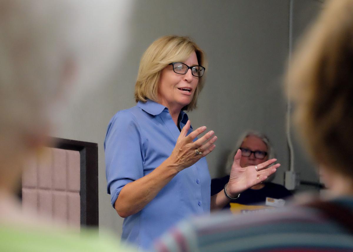 Rita Hart campaigns in Muscatine