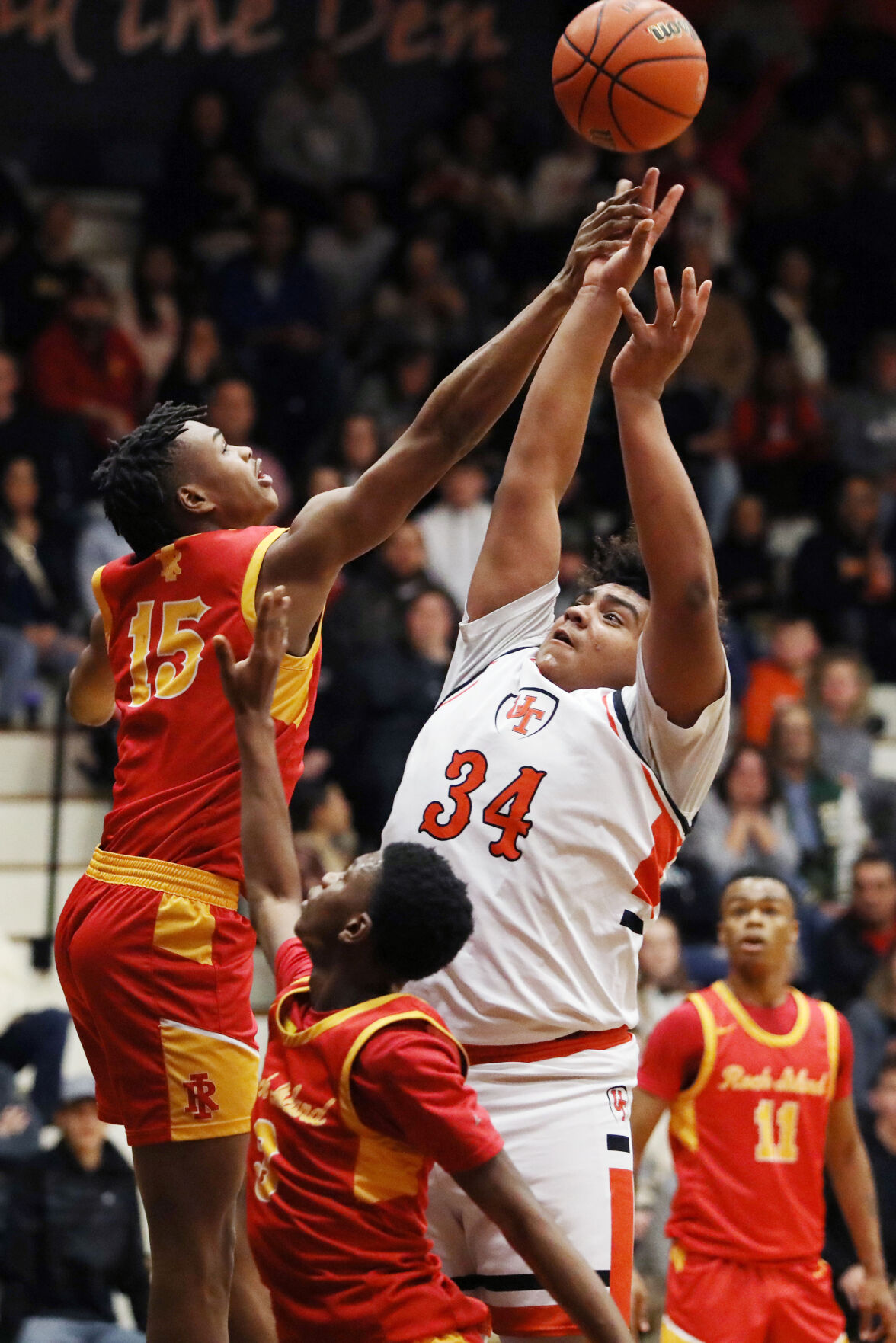 Rock Island High School boys’ basketball team dominates United Township with Coach Marc Polite leading the way