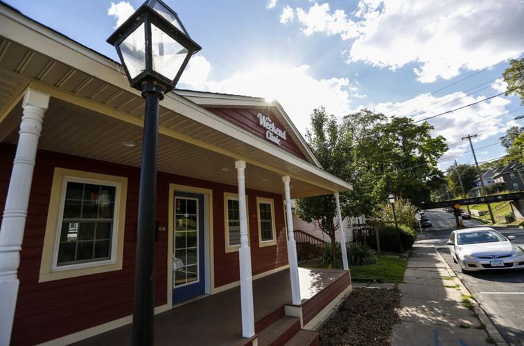 Row of new East Village businesses line 12th Street in Davenport