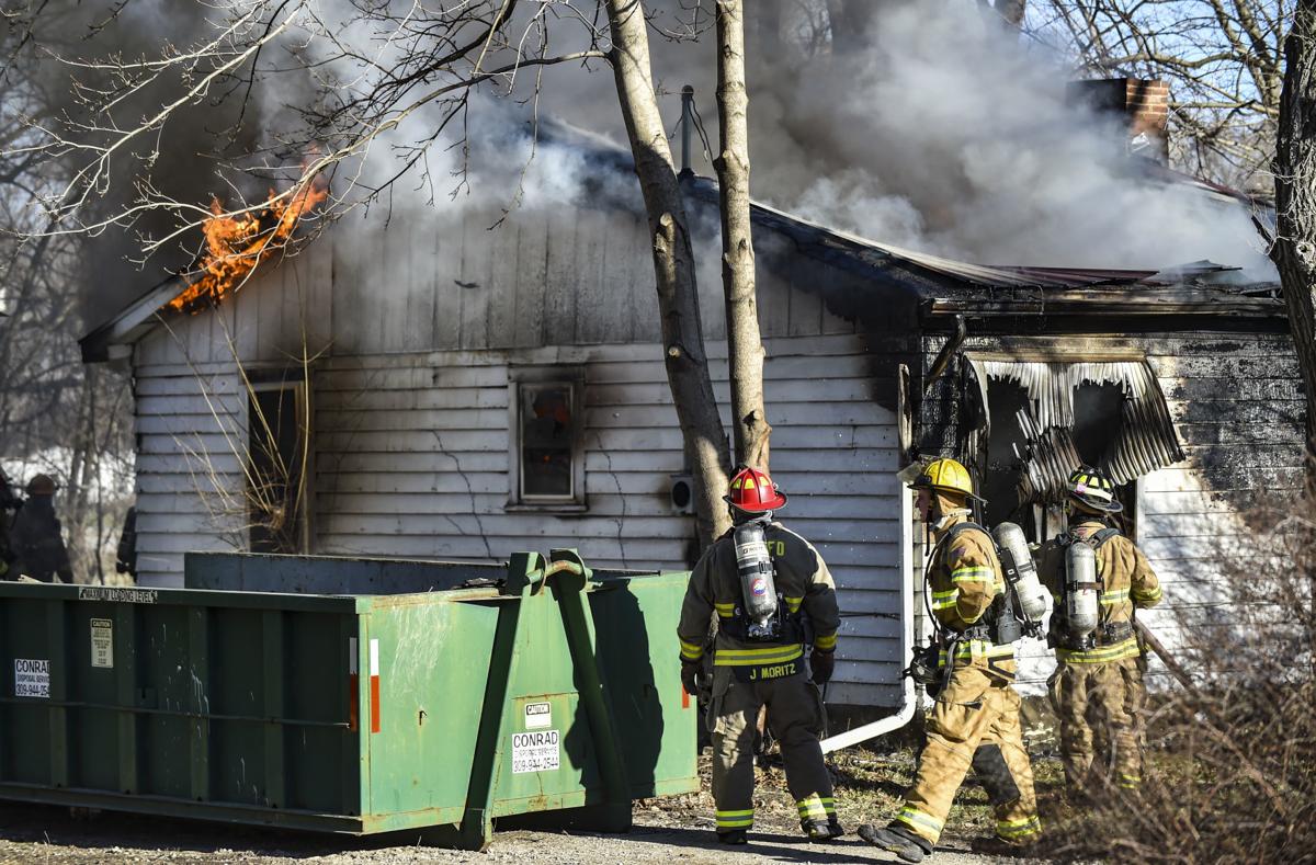 Firefighters battling flames at house in rural East Moline