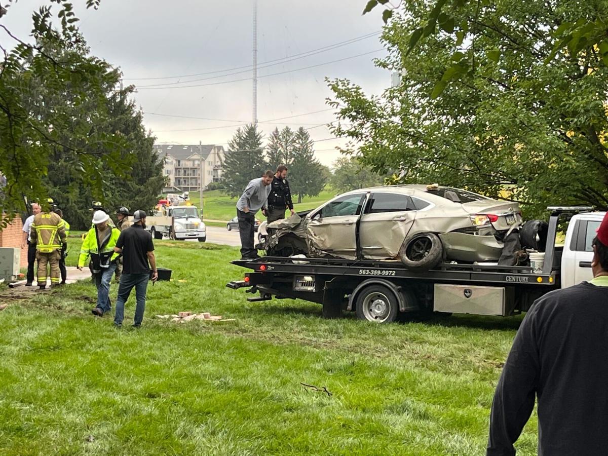 Bettendorf apartments evacuated after being hit by car