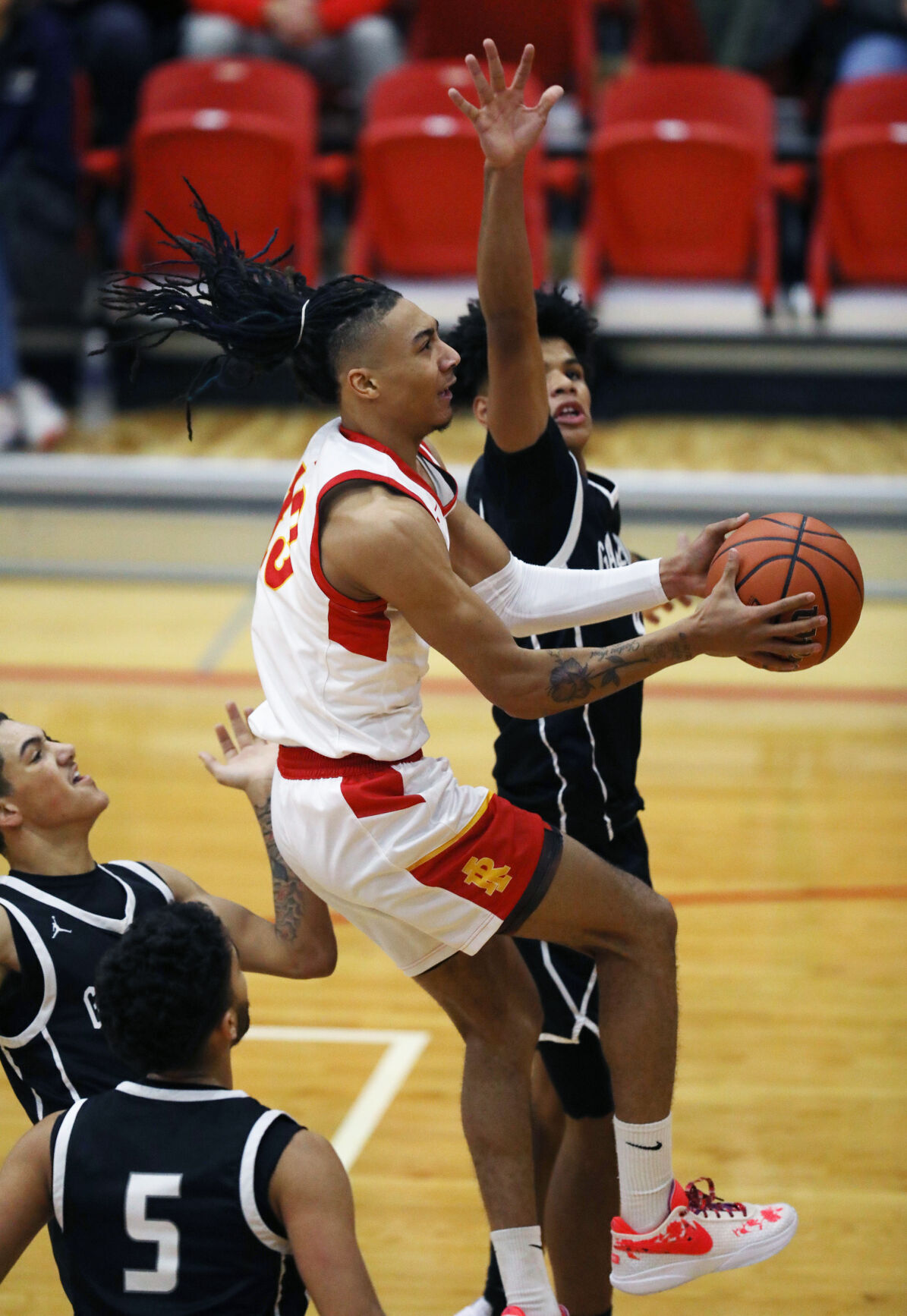 Rock Island rolls in State Farm Classic opener; See basketball roundup
