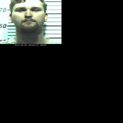 Man arrested after brandishing gun in alleged road rage incident