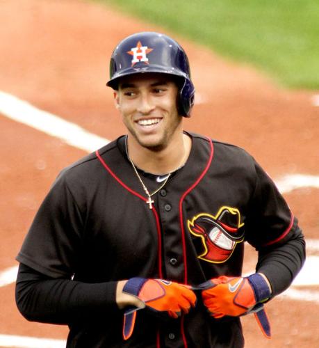 George Springer of the Houston Astros steals second base in the ninth