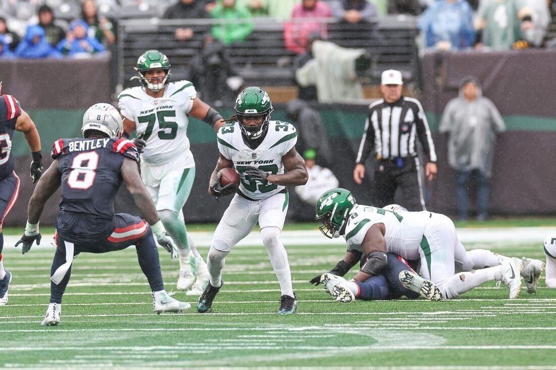 New England Patriots Tom Brady throws a pass in the first half against the  New York Jets in week 12 of the NFL at MetLife Stadium in East Rutherford,  New Jersey on