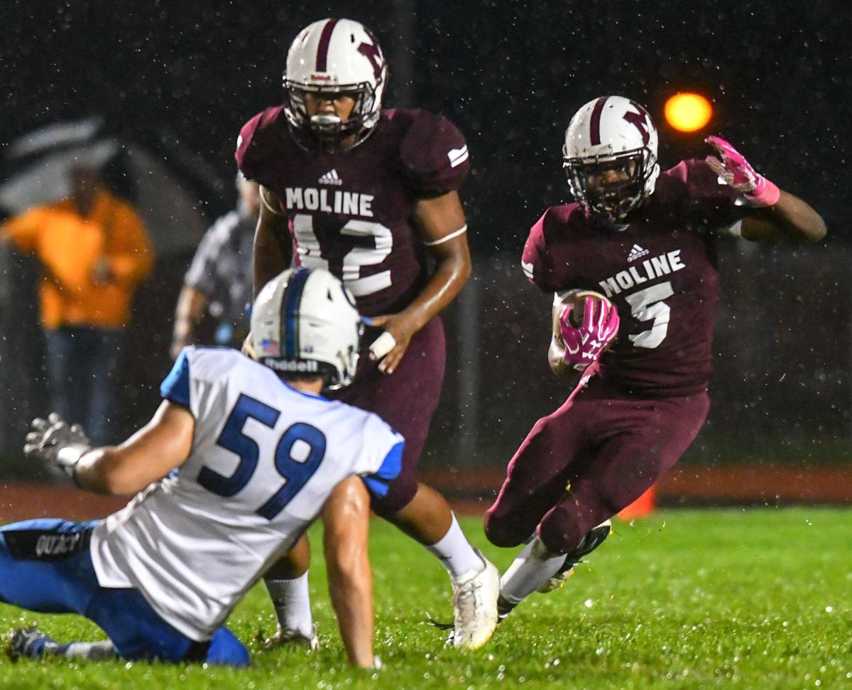 Moline Clinches Title Share With Win Over Quincy High School