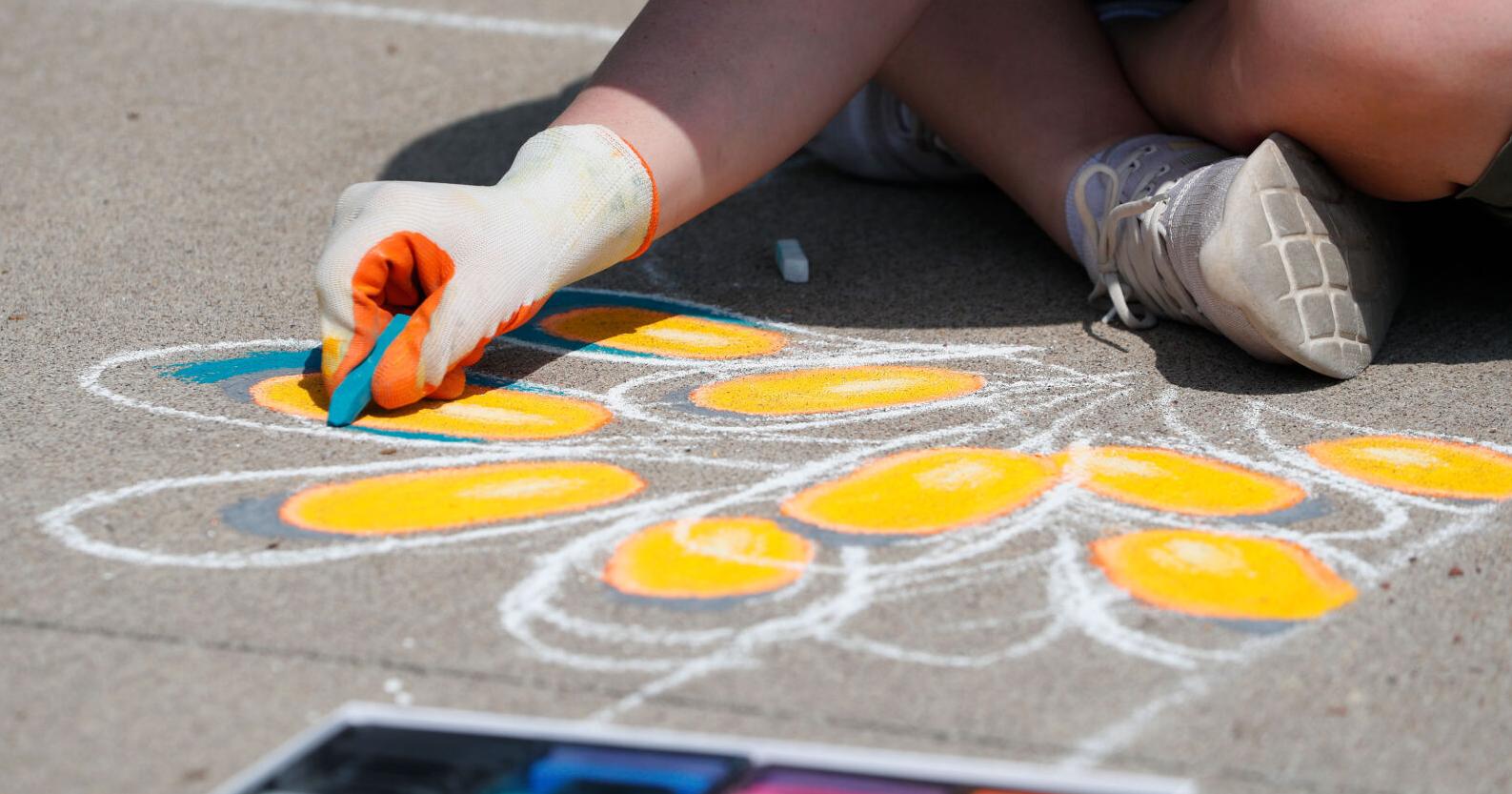 Artists gather to compete in the annual Chalk Arts Fest hosted by Quad City Arts - Vimarsana News