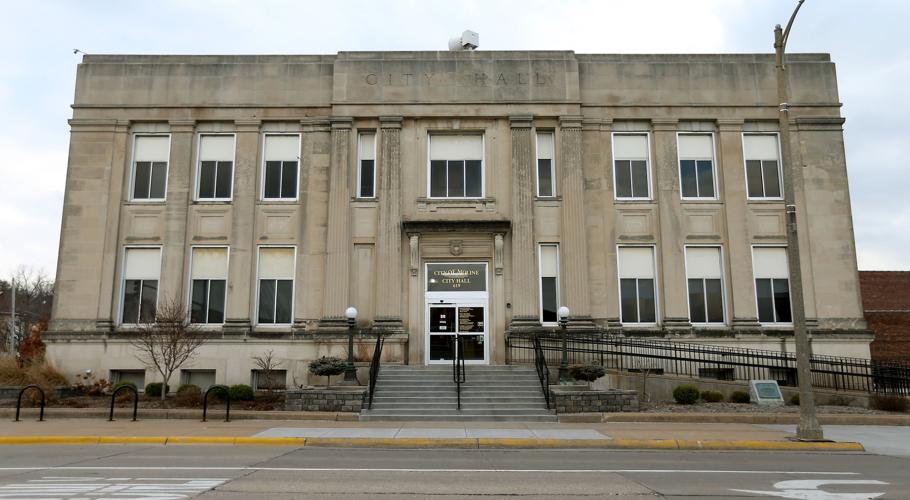 An Orion woman says East Moline denied her a job because she'd filed a