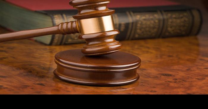 Woman accused of striking prosecutor at RICO Justice Center