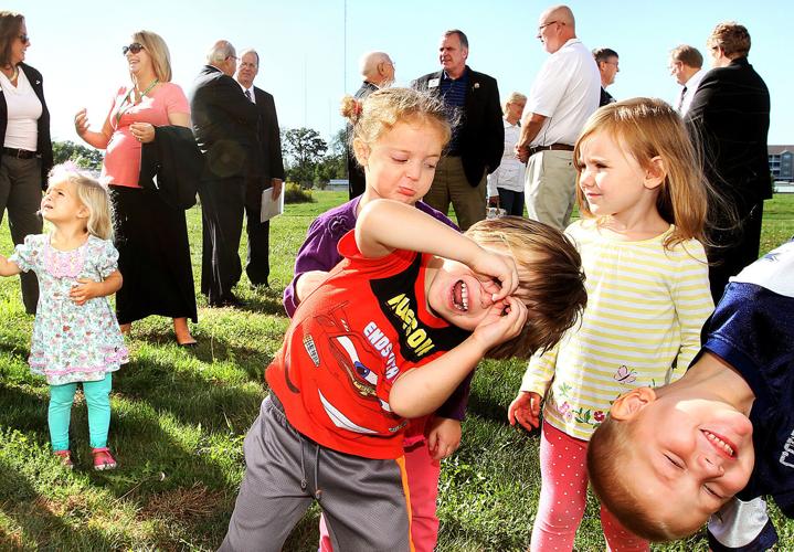 Officials break ground on Bettendorf Y expansion