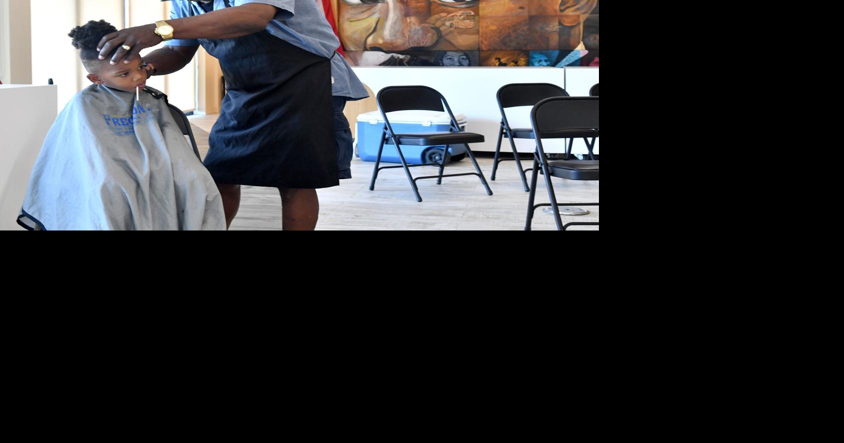 Photos Free student haircuts at the MLK Interpretive Center