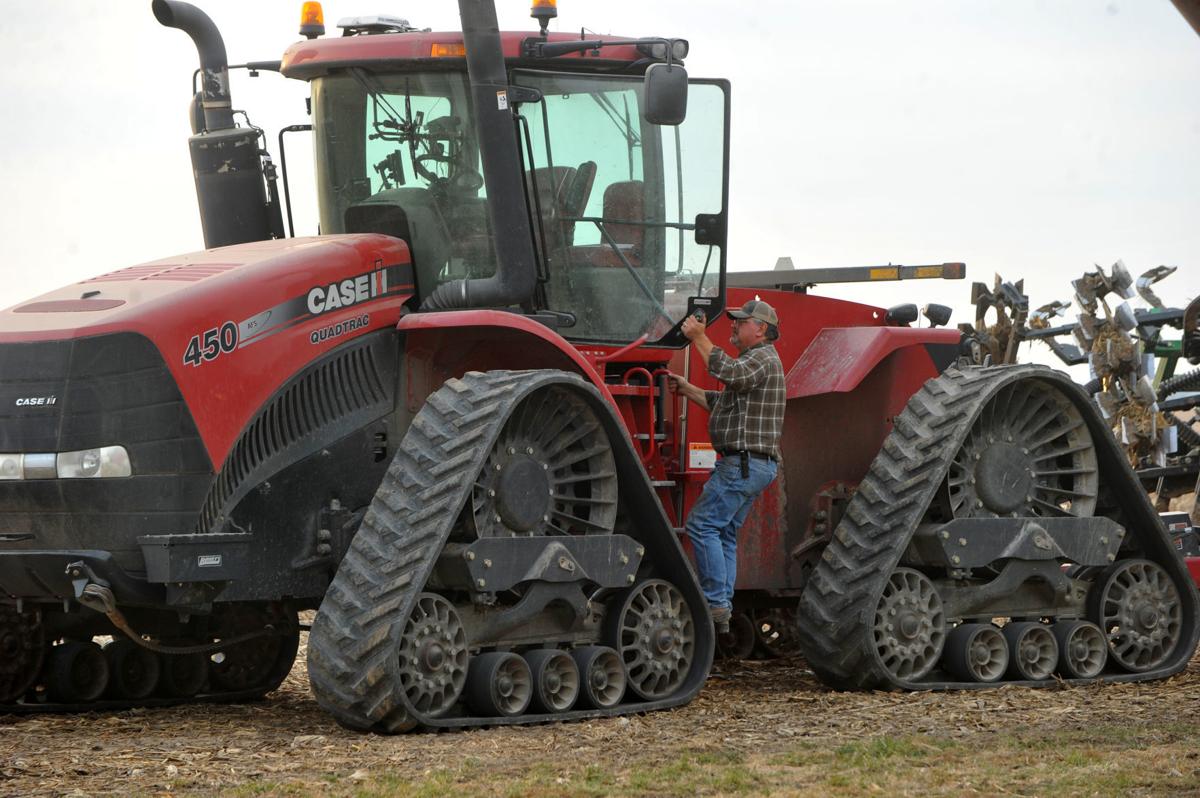 Michael Zecher, president of Mercer County Farm Bureau works his farm during harvest.