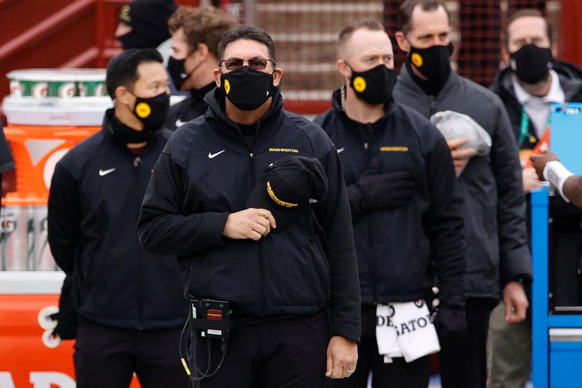 Head coach Ron Rivera of the Washington Football Team stands at attention prior to taking on the Seattle Seahawks at FedExField on December 20, 2020 in Landover, Maryland.