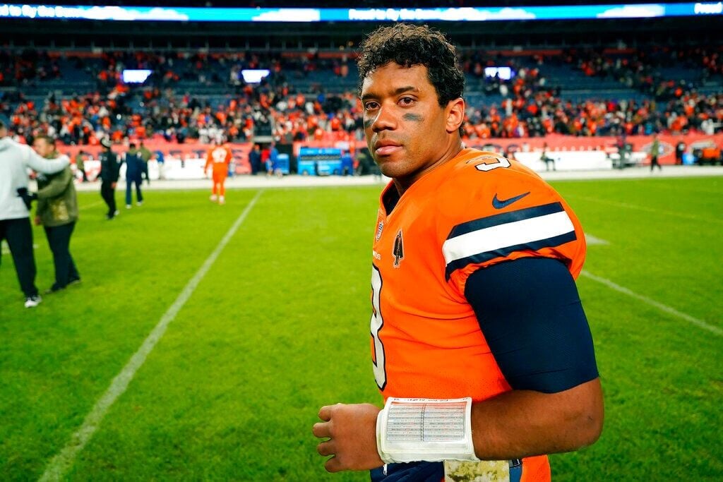 Broncos Wire - Russell Wilson in a Denver Broncos uniform 