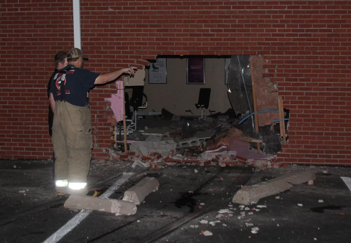 SUV crashes into Milan building