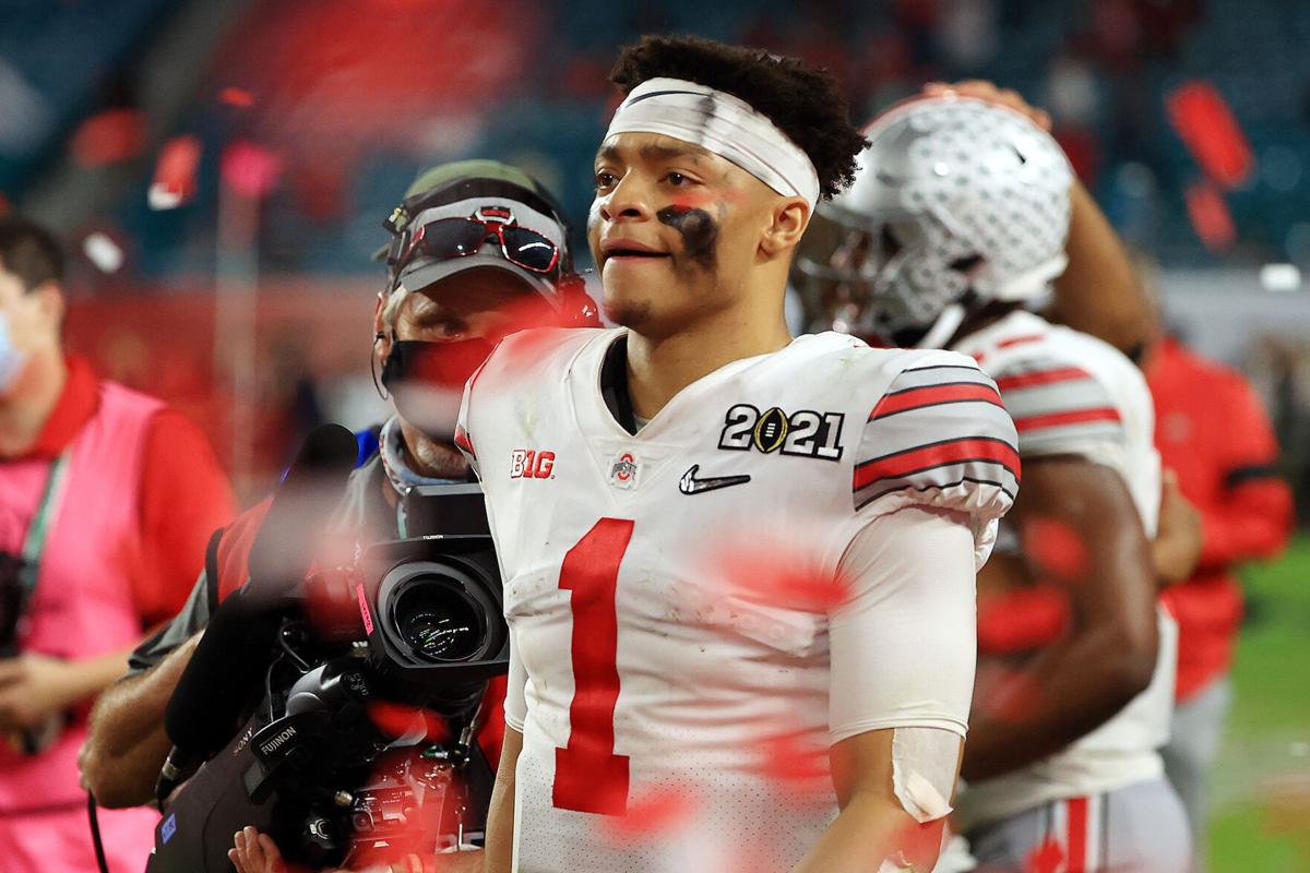 In this photo from January 11, 2021, Justin Fields of the Ohio State Buckeyes leaves the field following the College Football Playoff National Championship game against the Alabama Crimson Tide at Hard Rock Stadium in Miami Gardens, Florida.