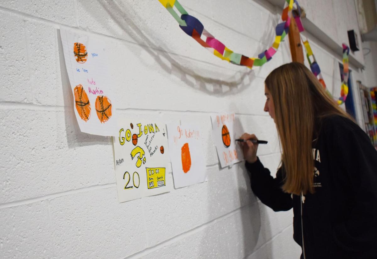 Iowa women’s basketball star Kate Martin visits Blue Grass Elementary