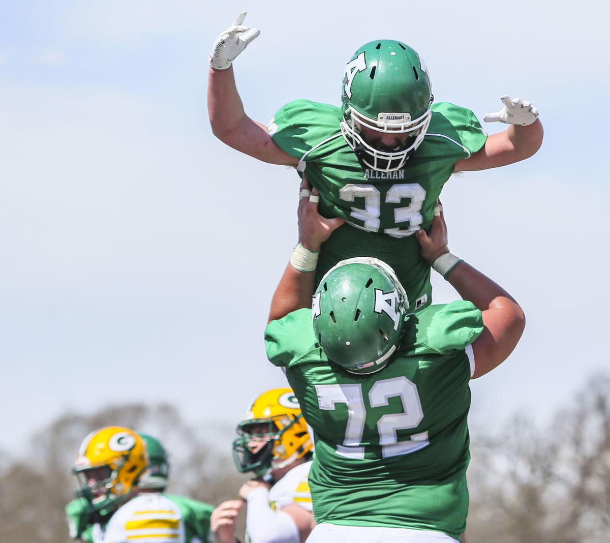 040521-qc-spt-gen-alleman-fball-17.JPG