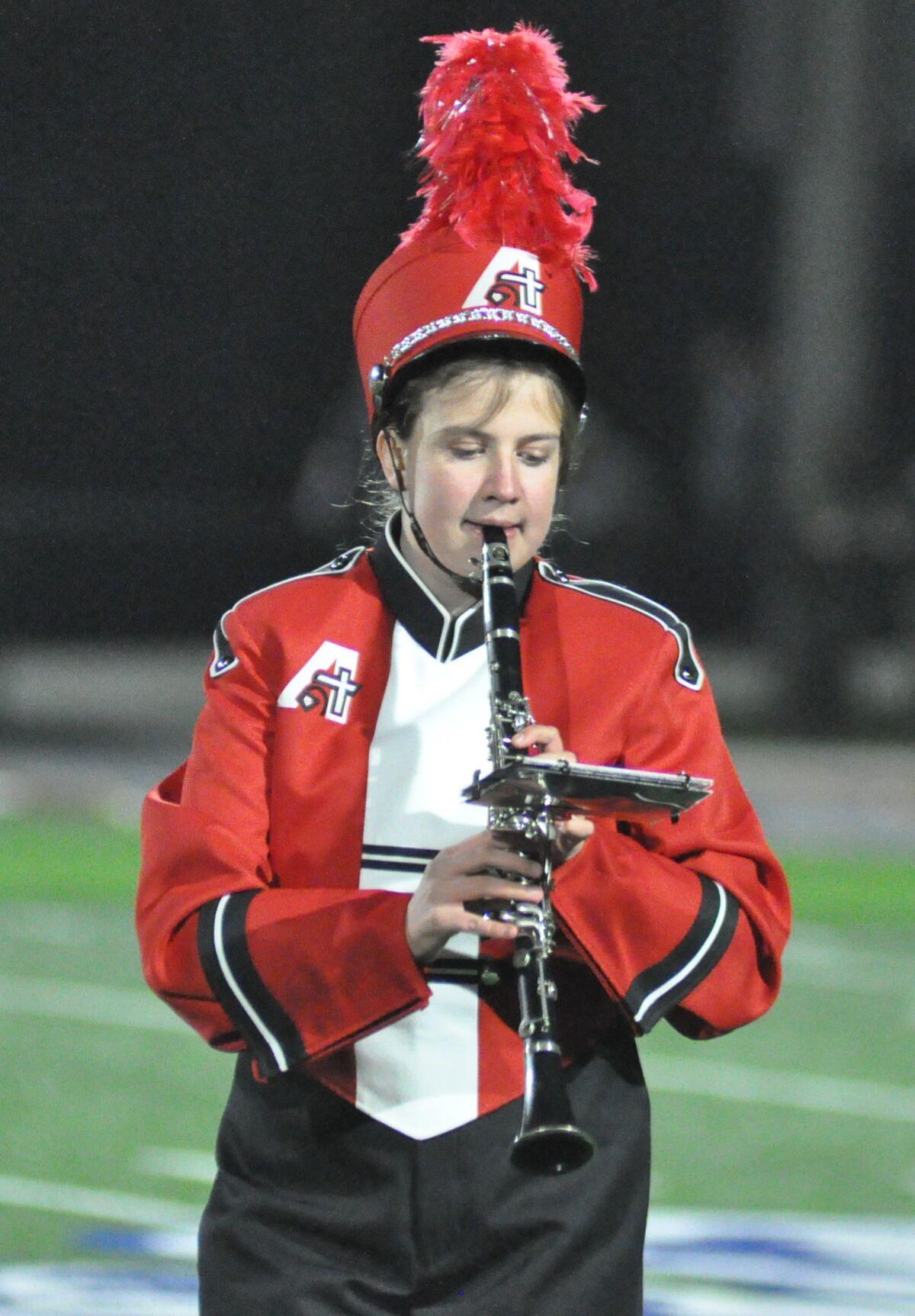 Photos: Davenport Assumption marching band performs at halftime of football  game (Oct. 20, 2022)