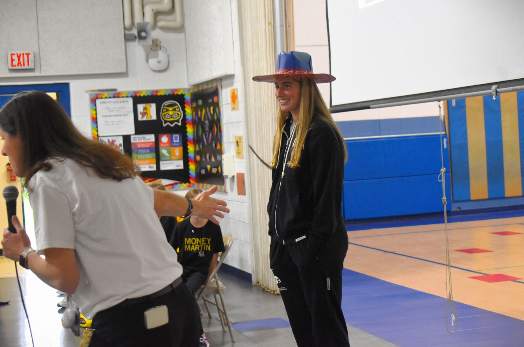 Iowa women’s basketball star Kate Martin visits Blue Grass Elementary
