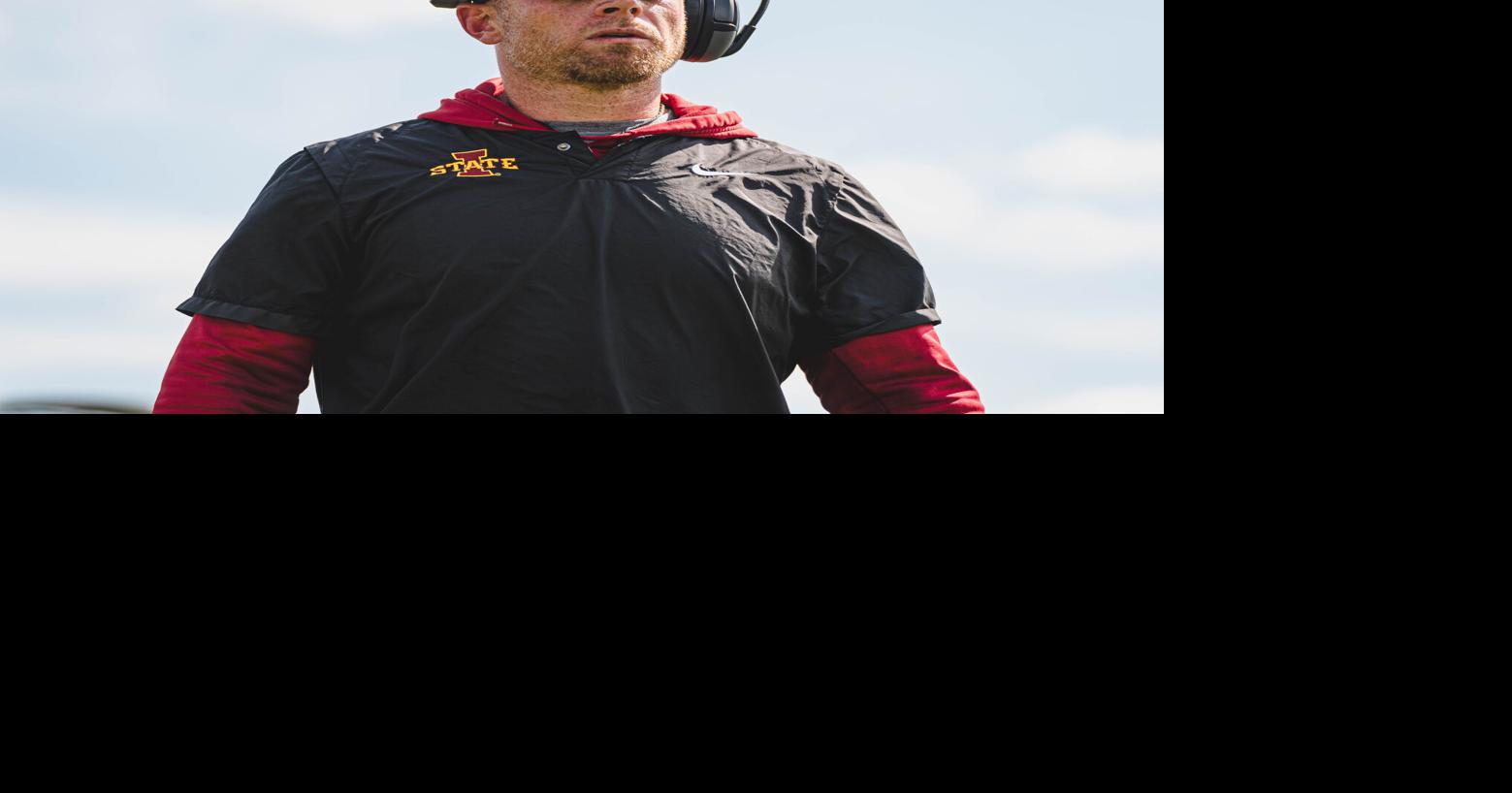 Offensive coordinator Tyler Roehl interviews with media