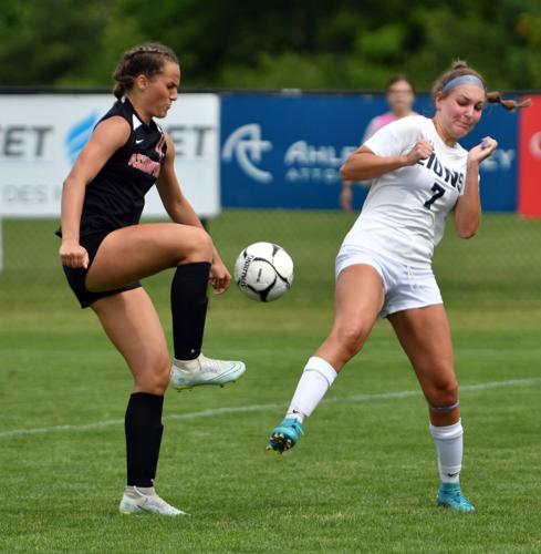 following through with a soccer kick