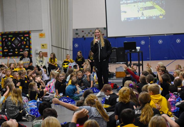 IOWA WOMEN'S BASKETBALL Martin stars in visit to Blue Grass Elementary