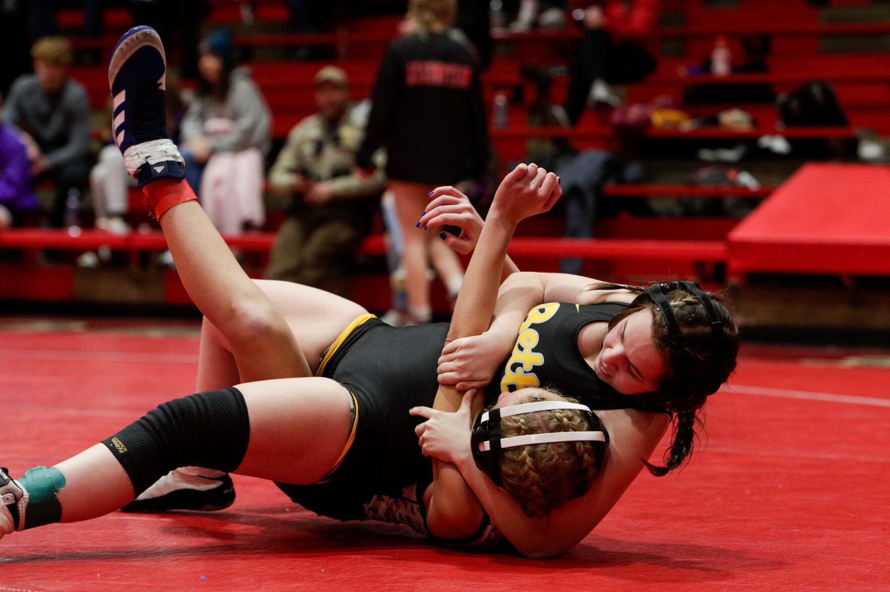 A new era Bettendorf captures first sanctioned girls wrestling event in picture