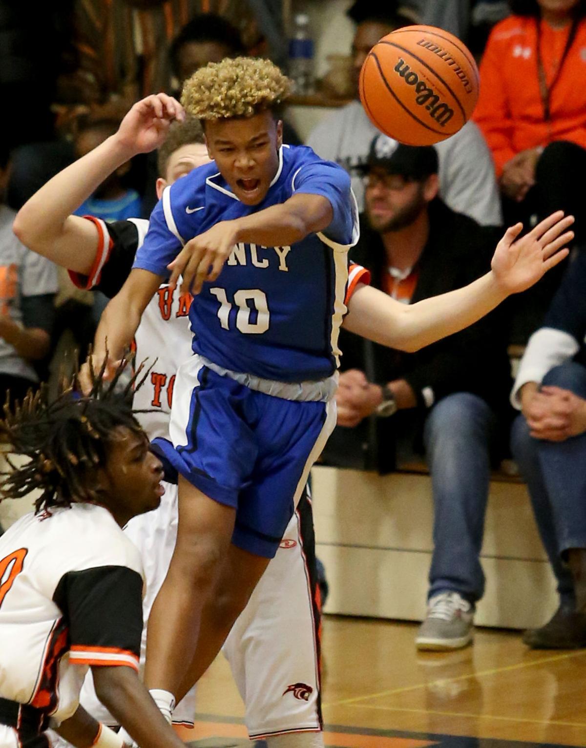 Photos Quincy at United Township Boys Basketball High School Boys