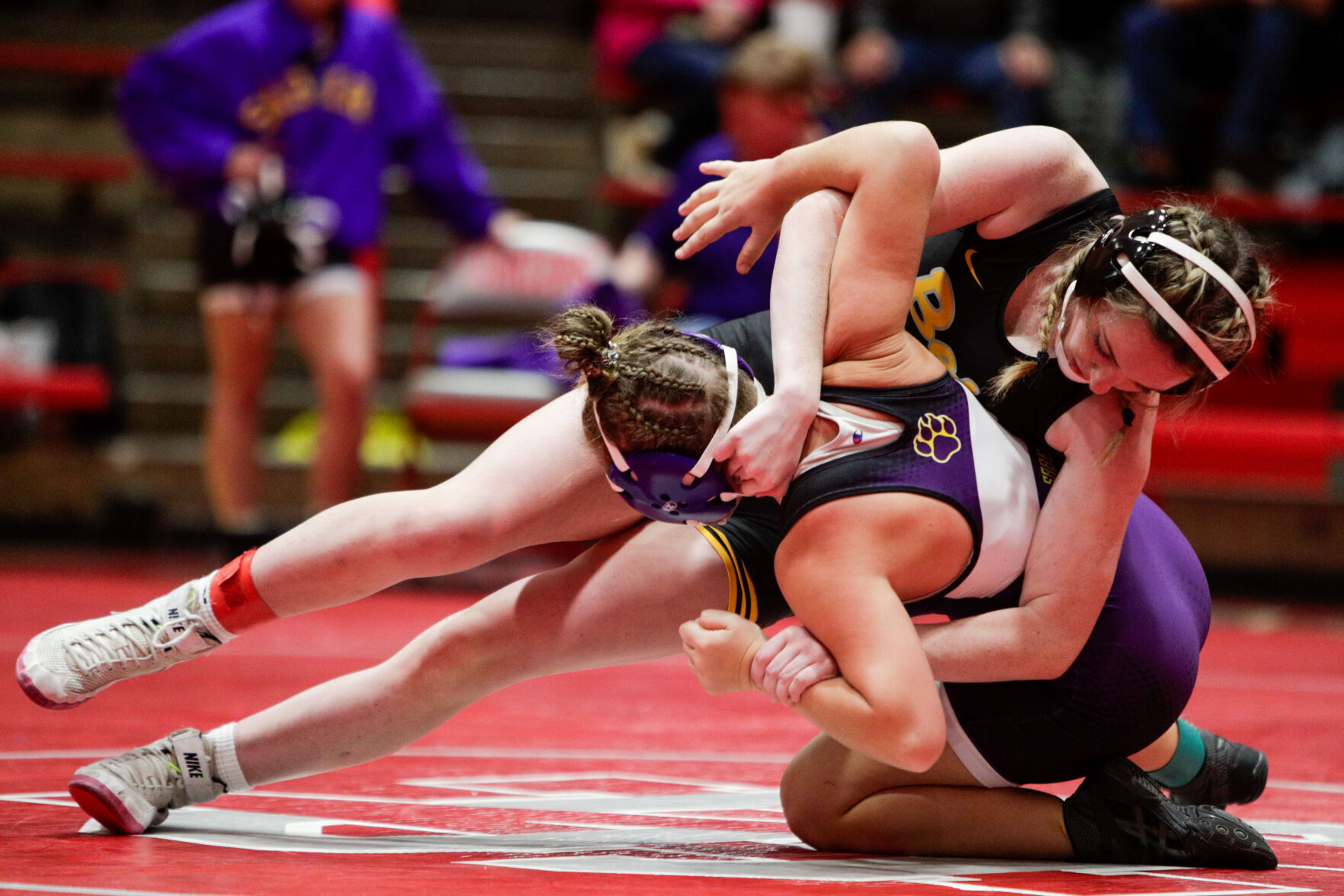 A new era Bettendorf captures first sanctioned girls wrestling event in image picture