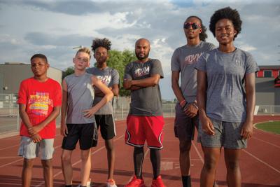 Divine Movement track club competing at nationals