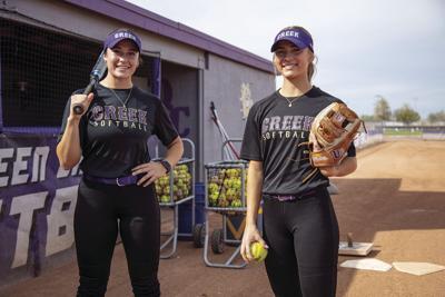 QC softball playing motivated under new coach Sports