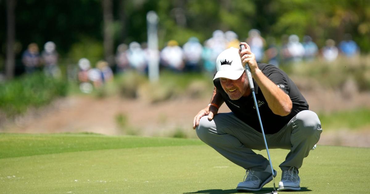 Alex Cejka from Germany studies his putt on the 12th hole. The first round of the 2026 Senior PGA Championship was held