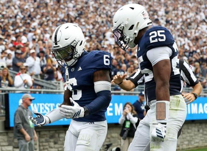 Penn State Nittany Lions wide receiver Koby Howard (6) celebrates with running back Quinton Martin Jr. (25) after scoring a touchdown during the second quarter against the Buffalo Bulls at West Shore Home Field at Beaver Stadium on Sept. 19, 2026.