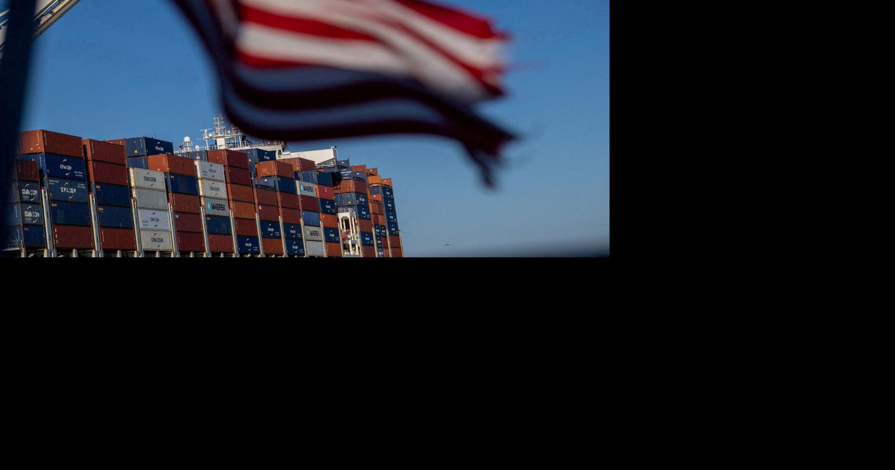 FILE PHOTO: A cargo ship full of shipping containers is seen at the port of Oakland, California