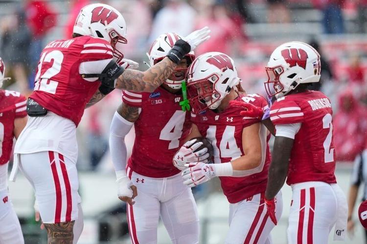 Sep 19, 2026; Madison, Wisconsin, USA;  Wisconsin Badgers linebacker Cooper Catalano (44) celebrates with teammates after returning a fumble for a touchdown during the third quarter against the Eastern Michigan Eagles at Camp Randall Stadium. Mandatory ...