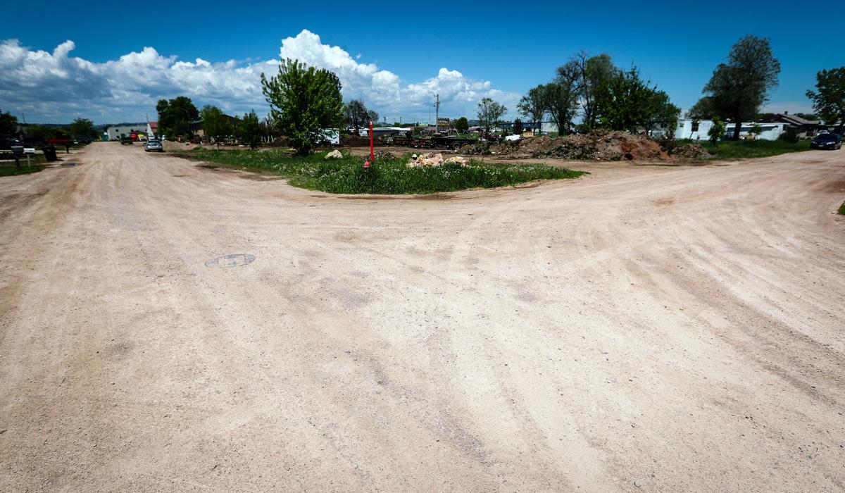 Unpaved roads still causing headaches Local