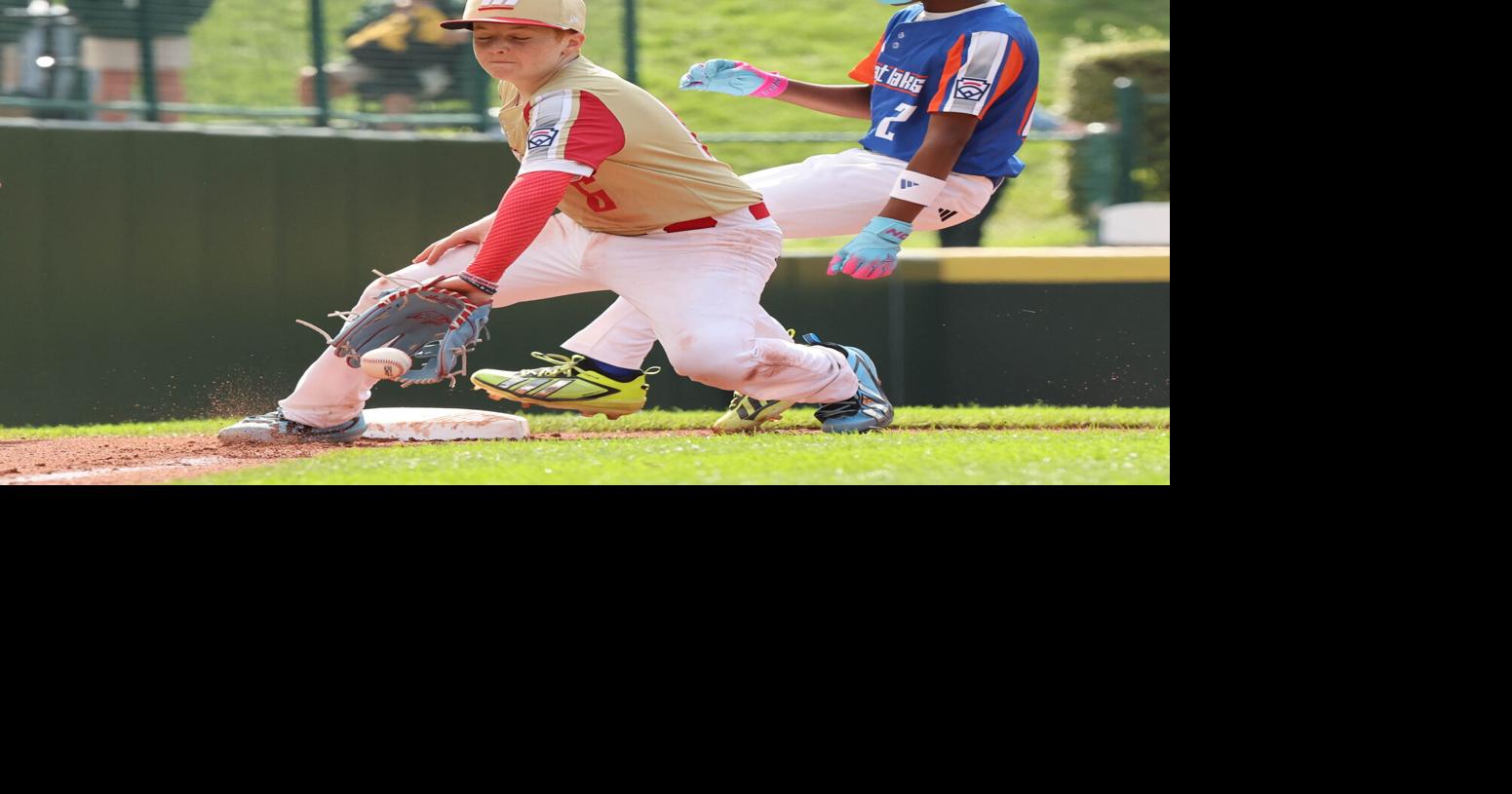 Bryson Williams of Hamilton West Side, Ohio, (Great Lakes Region) is safe at third base before the throw to Hudson Cowley of
