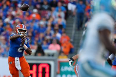 Florida Gators quarterback DJ Lagway throws a pass against Tulane during the Dec. 20, 2024, Gasparilla Bowl at Raymond James Stadium in Tampa, Florida.