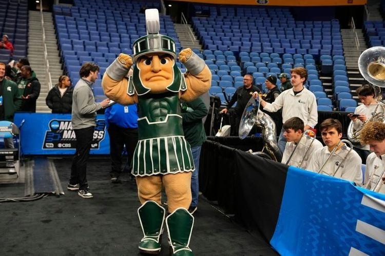 Mar 18, 2026; Buffalo, NY, USA; The Michigan State Spartans mascot pose for a photo during a practice session ahead of the first round of the men's 2026 NCAA Tournament at Keybank Center. Mandatory Credit: Gregory Fisher-Imagn Images
