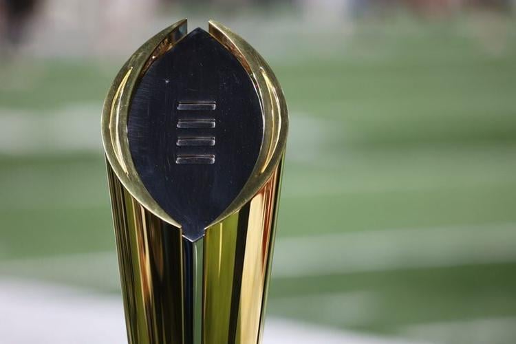 Jan 9, 2026; Atlanta, GA, USA; The College Football Playoff trophy on the sideline prior to the 2025 Peach Bowl and semifinal game of the College Football Playoff between the Oregon Ducks and the Indiana Hoosiers at Mercedes-Benz Stadium. Mandatory Cred...