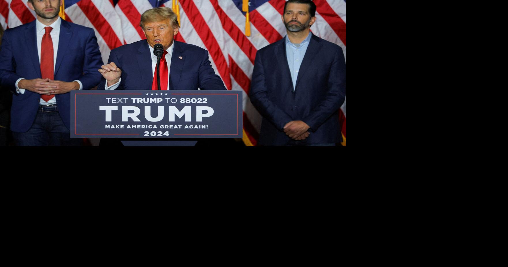 FILE PHOTO: Donald Trump appears with his sons Eric Trump and Donald Trump Jr. in Iowa in 2024