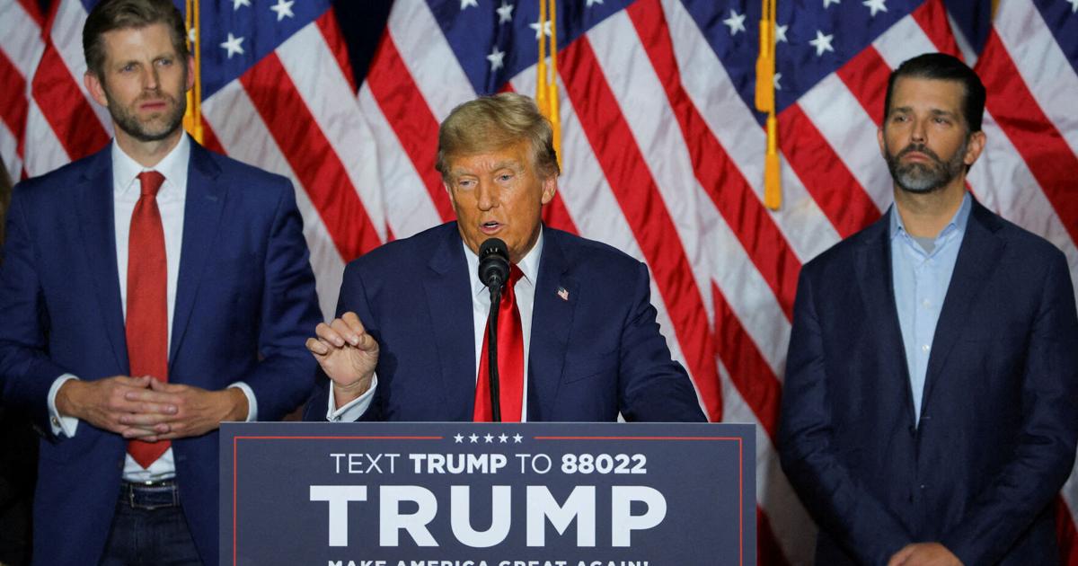 FILE PHOTO: Donald Trump appears with his sons Eric Trump and Donald Trump Jr. in Iowa in 2024