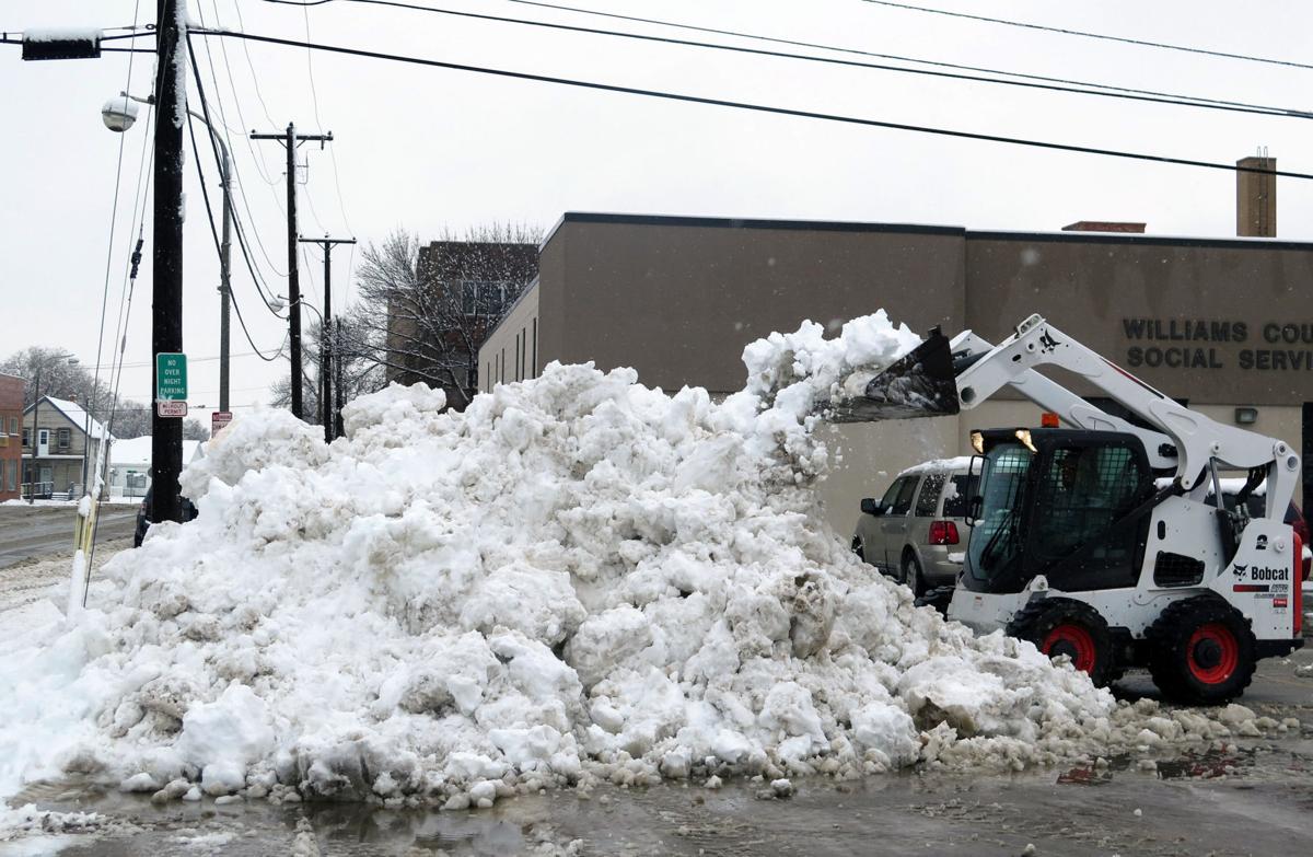 Minot architect sculpts with snow News